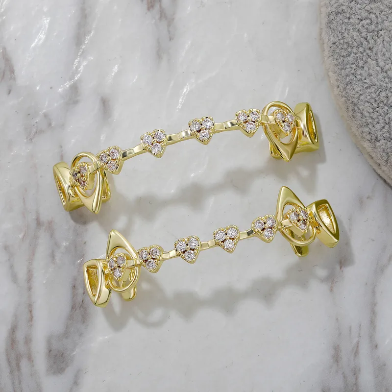 TOPGRILLZ  Hollow Heart Fang G - Body Jewelry Men recension och pris