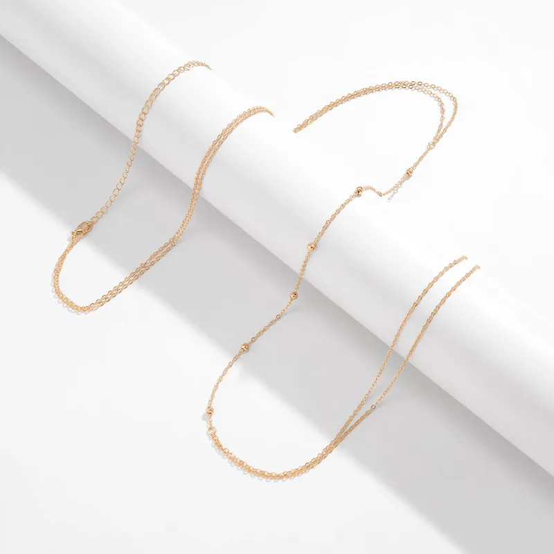 Simple Cross Chest Breast Bell - Body Jewelry Dress recension och pris